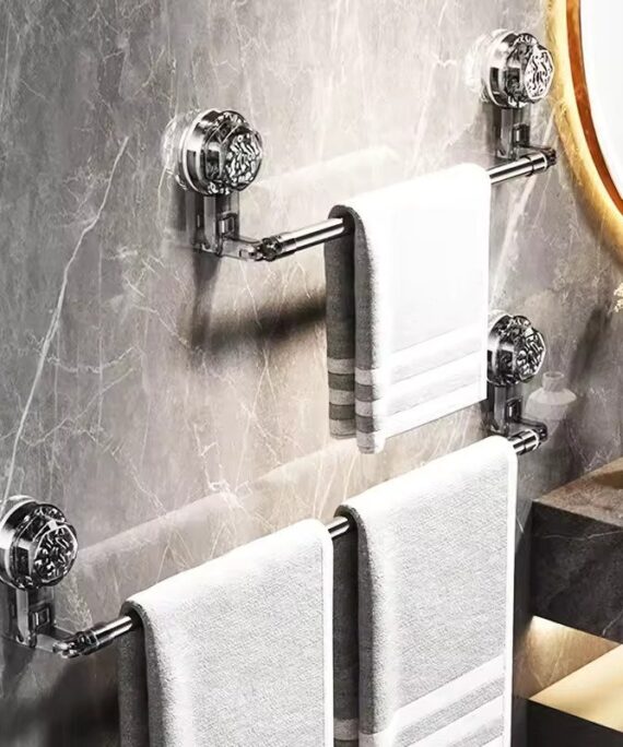 Adjustable suction cup towel holder